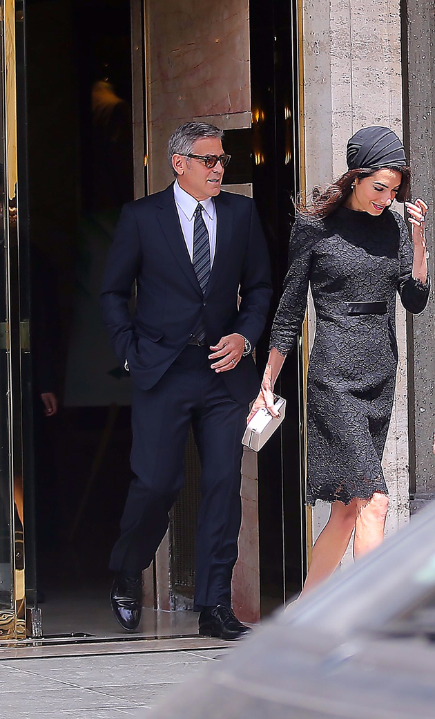 George Clooney and his wife Amal Alamuddin come out from their hotel in Rome, Italy.